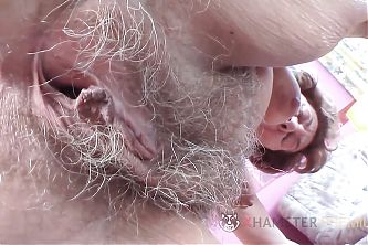 Horny granny fingering and rubbing her hairy pussy Part 1